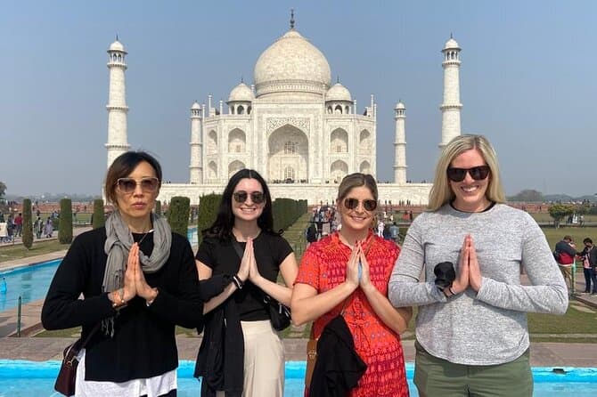 Travellers greeting each other at the Taj Mahal