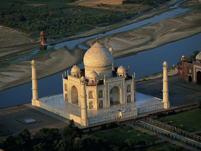 Aerial view of the Taj Mahal beside the river