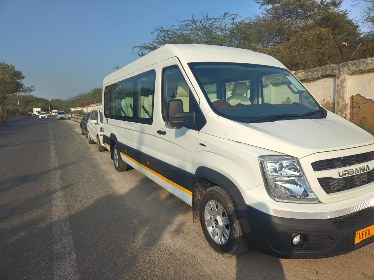 Rajhans Tours private tempo traveller on the highway