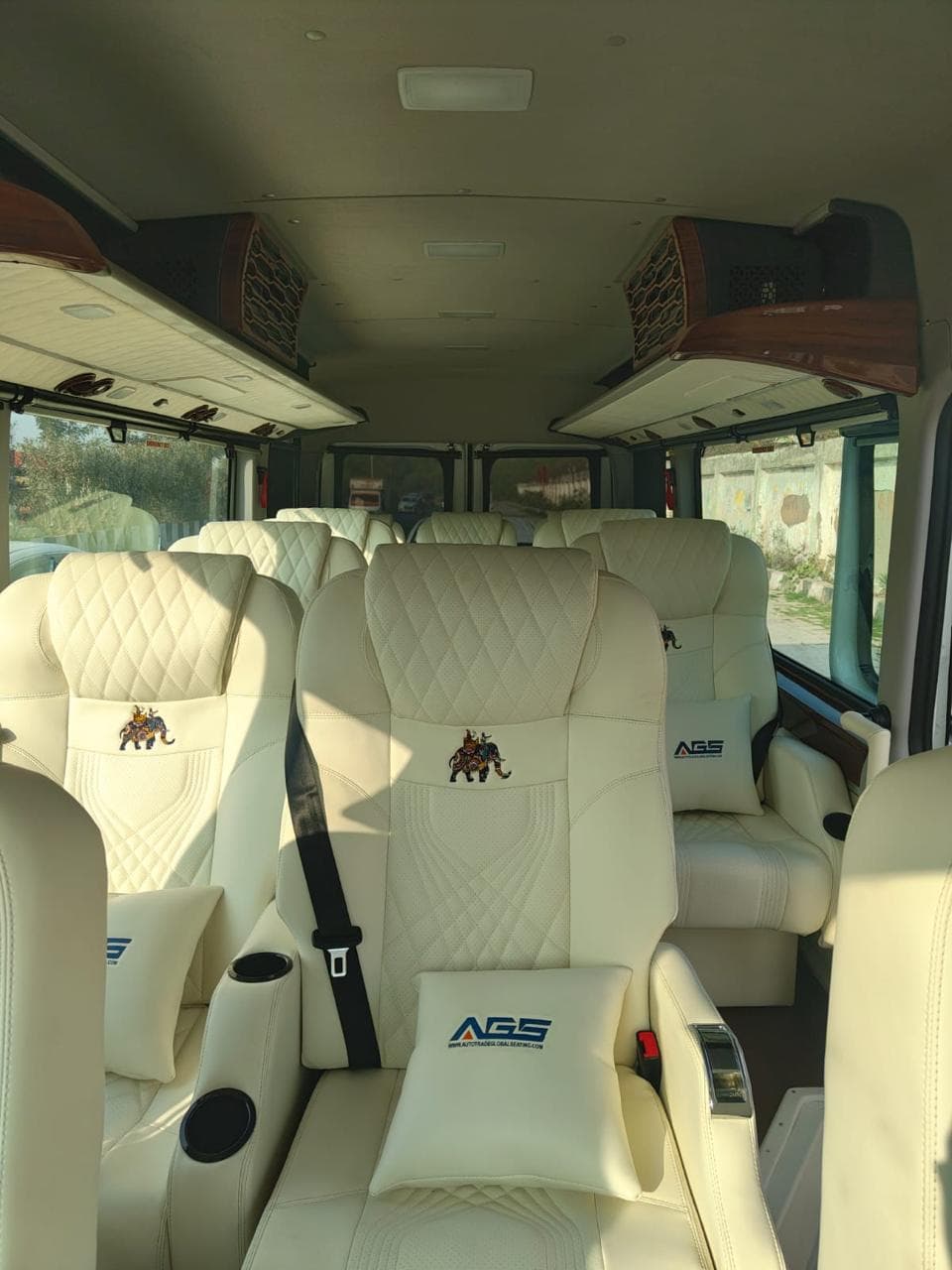Premium cream leather seats with embroidered headrests